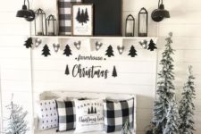 18 buffalo check pillows, buntings and an artwork for a stylish black and white Christmas entryway