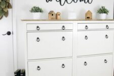 IKEA Hemnes shoe cabinets with black ring pulls and a stained countertop is a lovely idea for a farmhouse space