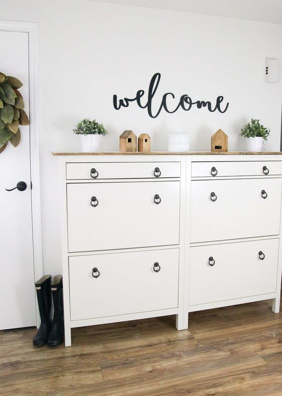 IKEA Hemnes shoe cabinets with black ring pulls and a stained countertop is a lovely idea for a farmhouse space