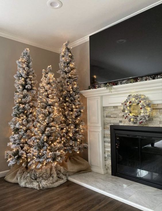 a farmhouse Christmas tree cluter with only lights looks very natural and very eye-catching