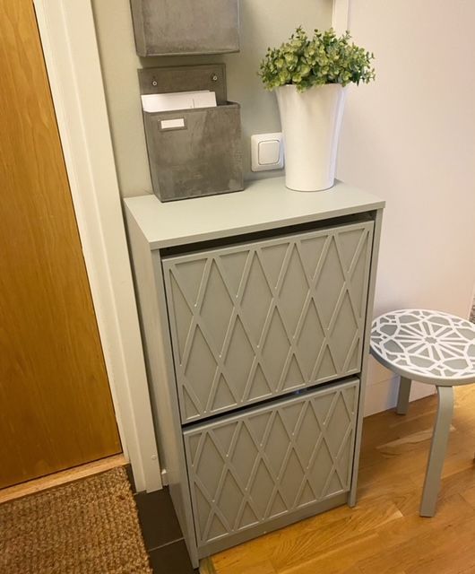 a grey IKEA Bissa hack with geometric panels and paint is a cool and lovely idea for a modern or Scandinavian space