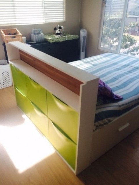 a kid's bed with a headboard with a neon green Trones piece for storage, which will give you much storage space