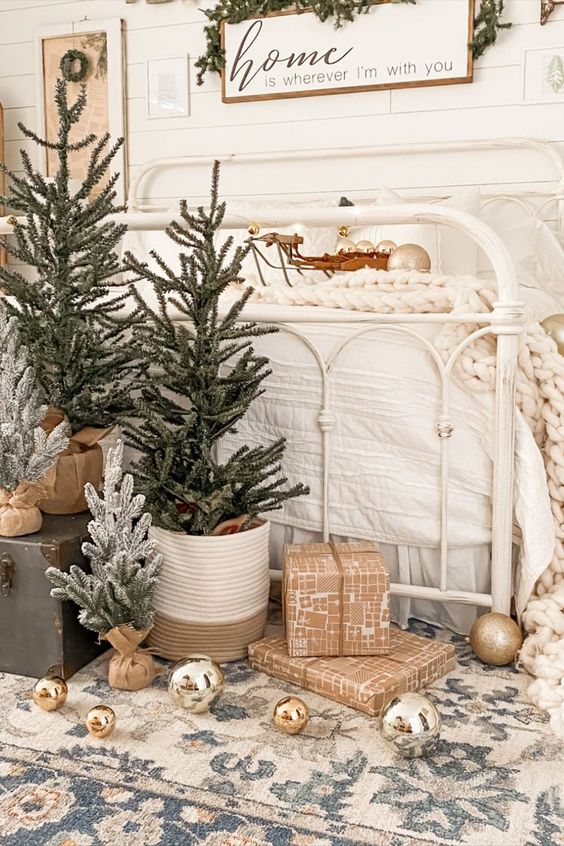 a pretty rustic Christmas tree display of trees in baskets is a cool solution for a rustic space, it's easy to make
