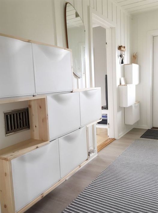 a unique IKEA Trones solution with pieces attached to the walls and new stained frames and countertops to save some floor space
