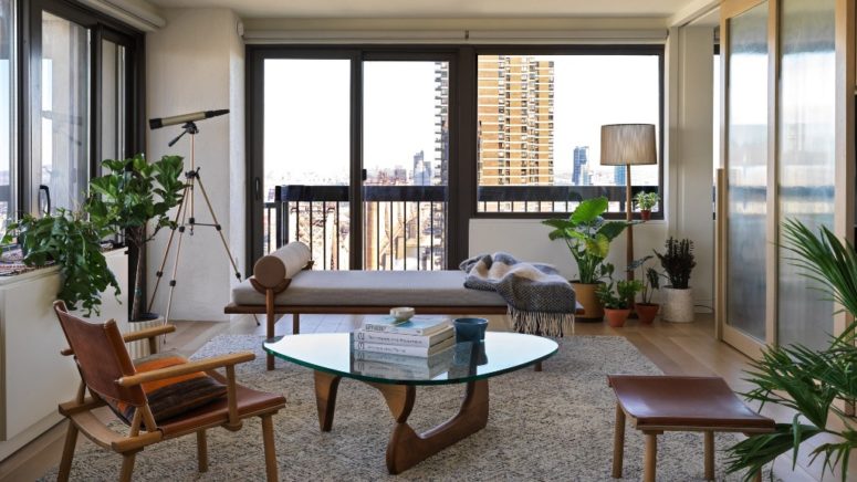 This contemporary apartment is located in a 70s building and features cool views