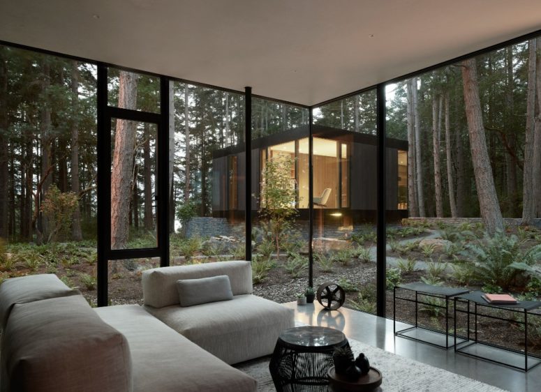 Glazed walls connect the spaces to outdoors and open them up, a neutral color palette doesn't distract from the views Glazed walls connect the spaces to outdoors and open them up, a neutral color palette doesn't distract from the views
