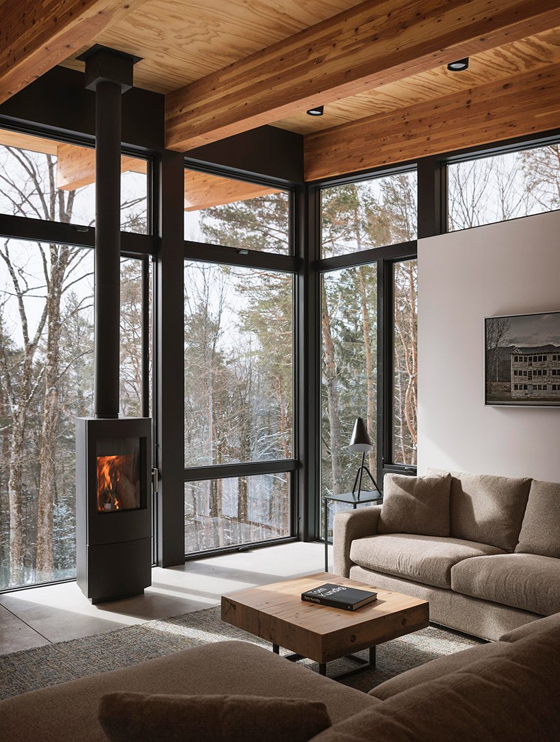 A minimalist hearth adds warmth to the space making it cozy and welcoming