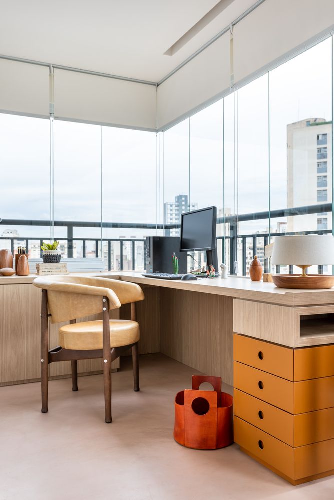 a cool home office with panoramic windows The workspace is one of the coolest areas of the apartment thanks to the panorama windows - this space gets not only much light but also amazing views