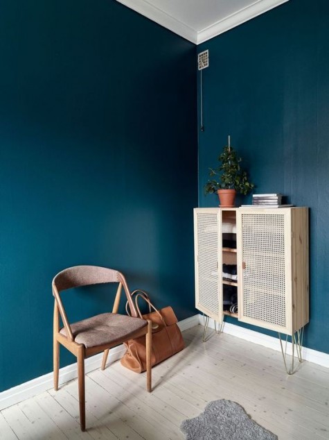 an IKEA Ivar cabinet spruced up with hairpin legs and cane doors