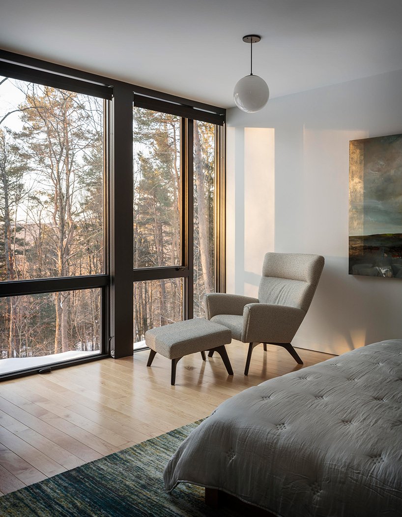 The bedroom also features amazing views through a glass wall