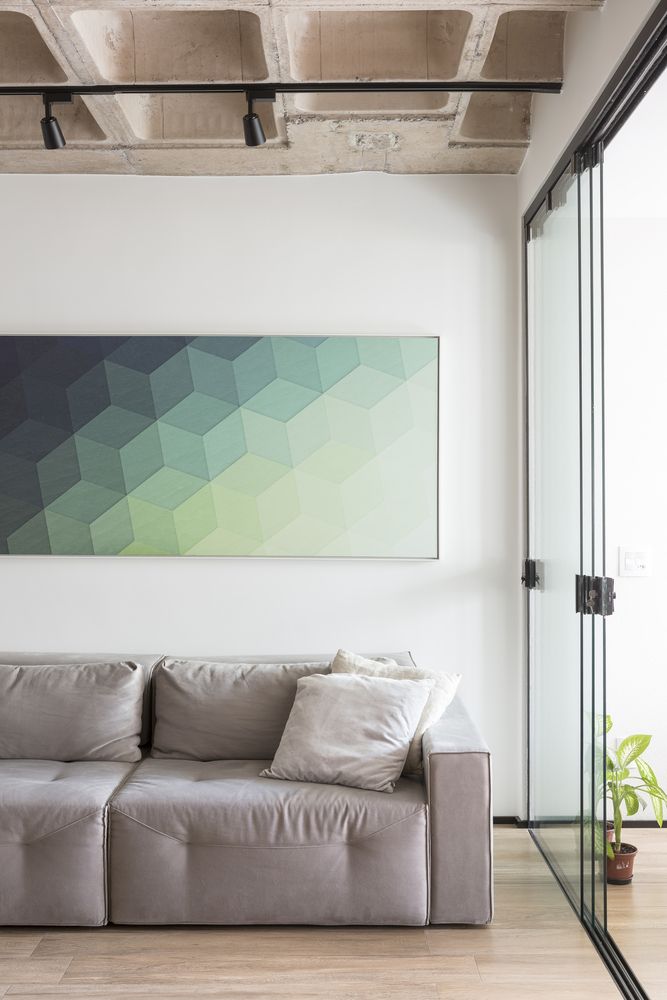The sliding glass doors can separate the living room from the other spaces without adding a visual barrier The sliding glass doors can separate the living room from the other spaces without adding a visual barrier