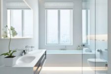 11 a super clean and sleek white minimalist bathroom with built-in lights, a large window and a floating vanity