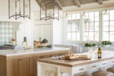 13 a neutral rustic kitchen with two kitchen islands that match, one for cooking and another for meals