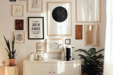 23 a stunning boho gallery wall with mismatching frames and various signs and works of art