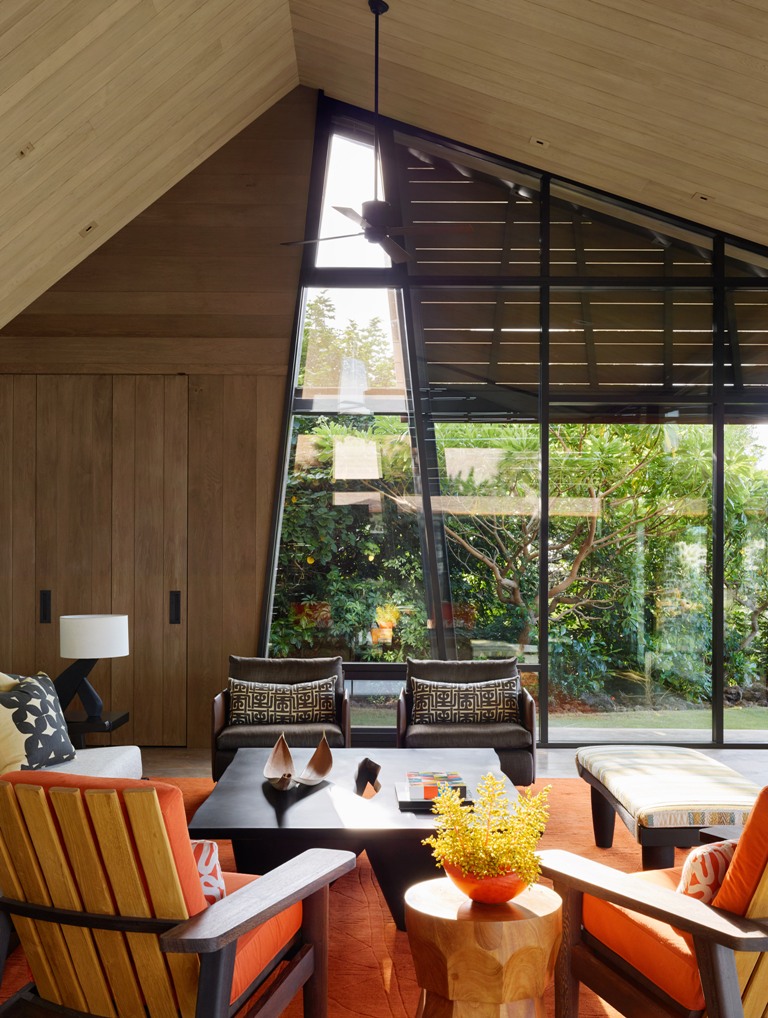 The living room is done with bright and statement furniture, there are bold contrasts and lots of natural light The living room is done with bright and statement furniture, there are bold contrasts and lots of natural light