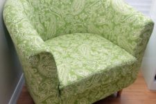 03 a reupholstered with bright botanical print fabric IKEA Tullsta chair is a bold idea and you can fit any fabric you like