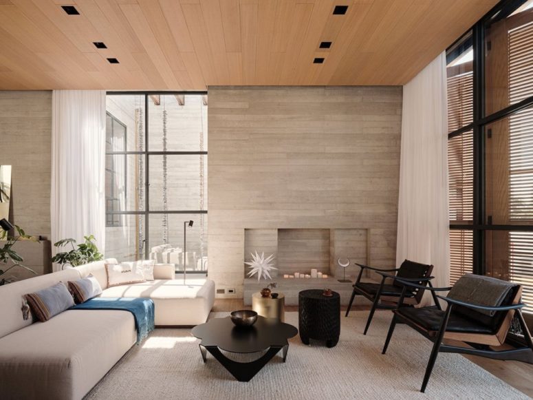 The living room is done with wood and plywood, in a neutral color palette and with catchy furniture pieces The living room is done with wood and plywood, in a neutral color palette and with catchy furniture pieces