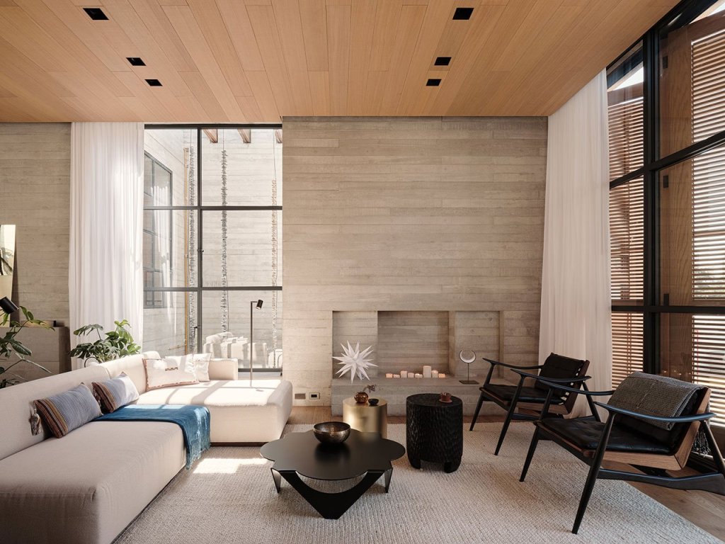 The living room is done with wood and plywood, in a neutral color palette and with catchy furniture pieces