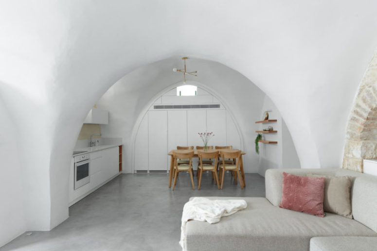 The main space is an open layout with a kitchen and dining space, too