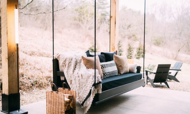 The swing bed is a cool piece to relax on, it's close to the firepit to enjoy coziness