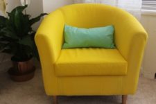 04 an IKEA Tullsta chair painted in bold yellow using fabric paint and with a mint pillow for a brighter look