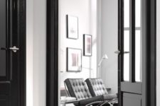 04 glossy black doors add catchiness and a slight shine to the neutral and monochromatic spaces like these ones