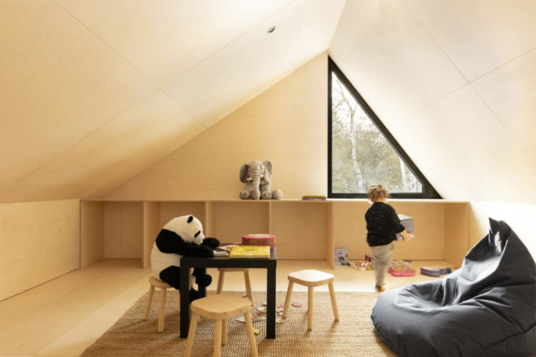 The upper, attic space, is given to the kid, it's a comfortable and cozy playspace with cool furniture The upper, attic space, is given to the kid, it's a comfortable and cozy playspace with cool furniture