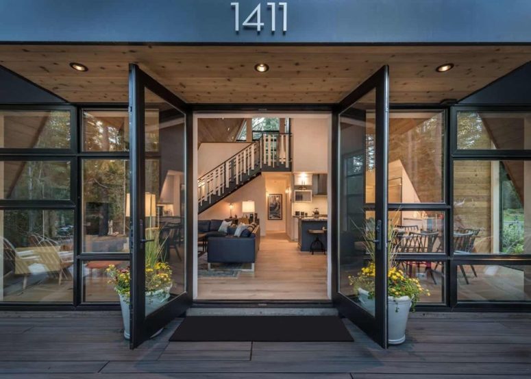 The glazed facade also include large glass doors which open up and allow the living spaces to extend outside The glazed facade also include large glass doors which open up and allow the living spaces to extend outside