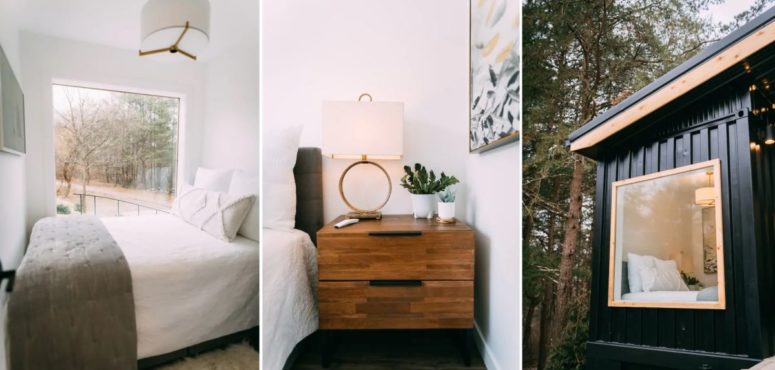 The tiny bedroom is super cozy and has a large window that overlooks the forest