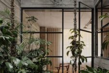 09 Inner courtyards enliven the indoor spaces with lush plants