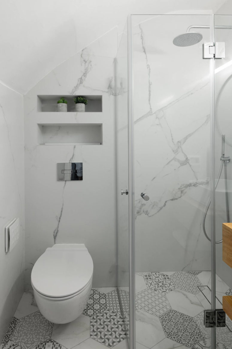 The combo of white marble and catchy printed tiles is a very cool and fresh idea
