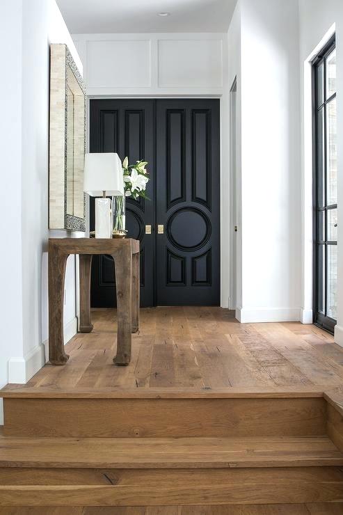 various types of doors painted black and spruced up with chic handles and knobs will bring elegance to your space