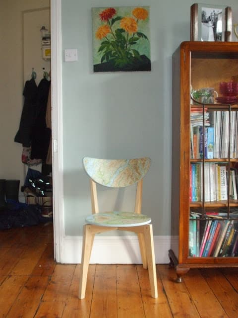 an IKEA Nordmyra chair refreshed with an old map will show off your love to travelling and your adventuruous spirit