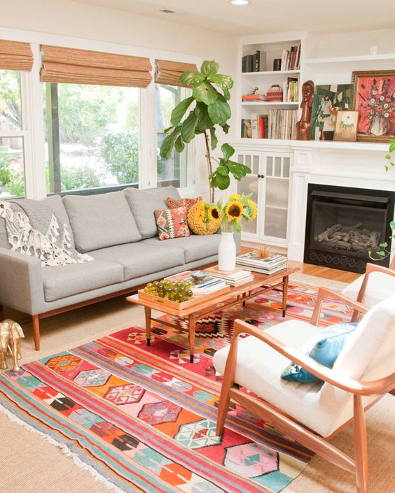a single colorful rug like this one totally changes the whole look fo the room making it fun