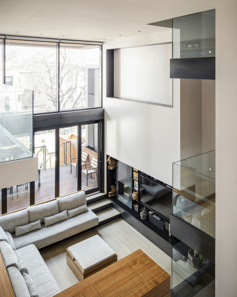 This contemporary Brooklyn townhouse is a nice example of how such an urban home can stay in touch with nature
