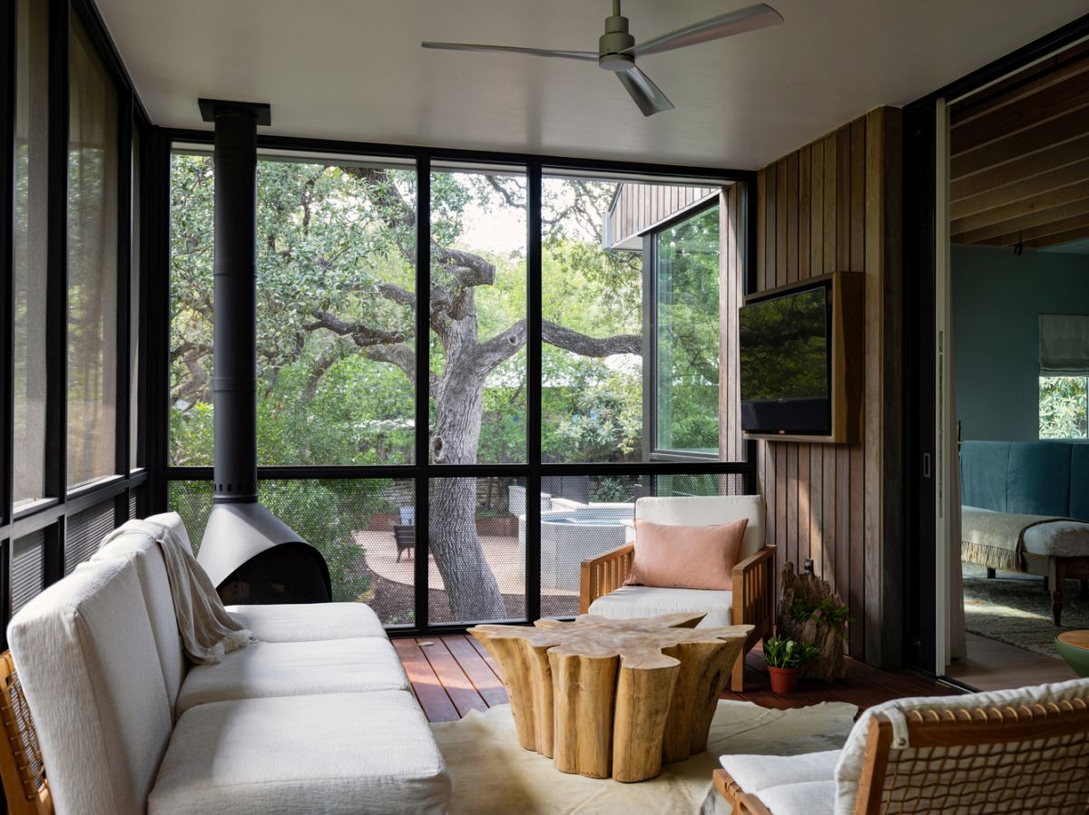 This house is a welcoming space done in an eclectic mix of modern and rustic and trying to merge with nature around it