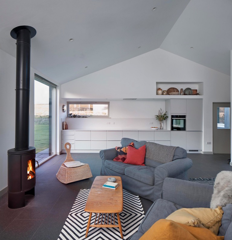 The interiors are done in white, with grey floors, with contemporary furniture and panoramic views of the surroundings The interiors are done in white, with grey floors, with contemporary furniture and panoramic views of the surroundings