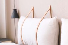 02 make a hanging headboard yourself hanging soem soft pillows on leather cords to secure them right