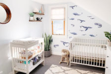 04 a serene bedroom with a whale print wallpaper wall for an accent is a cool and inviting space