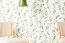 04 classic botanical wallpaper with a retro feel and a matching green porcelain lamp create a welcoming and cool space