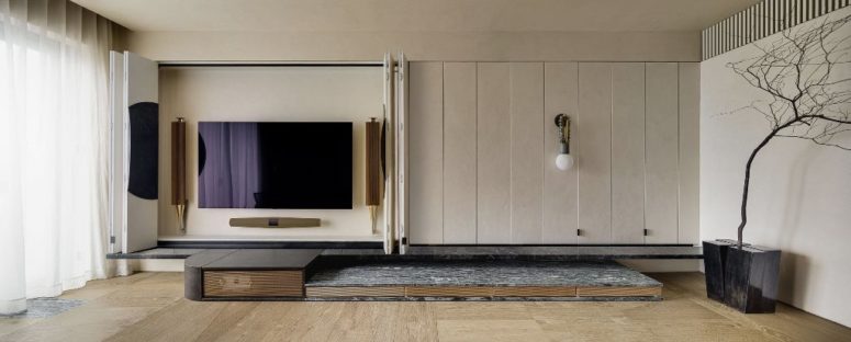 One part of the panels hides a TV unit