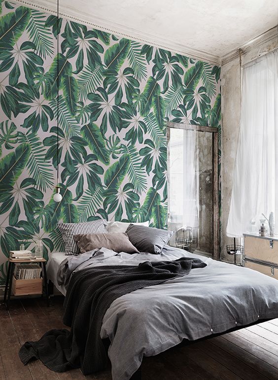 tropical leaf wallpaper never goes out of style but if it's very active, keep it to just one accent wall in your space