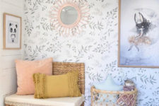 07 a sweet farmhouse nursery with a delicate leaf print wall that makes the space softer and more welcoming