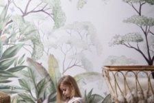 07 use botanical print wallpaper in the nursery to give it a peaceful and natural feel and match the furniture with this wall