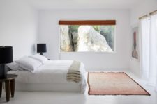 08 Another bedroom features a rock view, quirky furniture and art