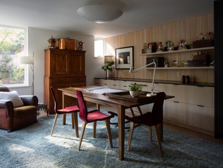 The interior design is an eclectic mix of modern and rustic elements which complement each other harmoniously