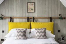 12 a neutral bedroom with a plenty of pattern and a bright yellow pillow headboard hanging on leather belts looks bright