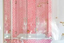 14 a bright yet small bathroom with pink printed tiles and all white everything to create a bold and catchy contrast