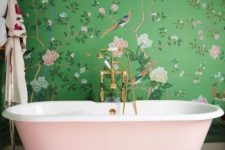 16 a chic girlish bathroom with flora and fauna wallpaper, a pink clawfoot tub and gold fixtures looks amazing