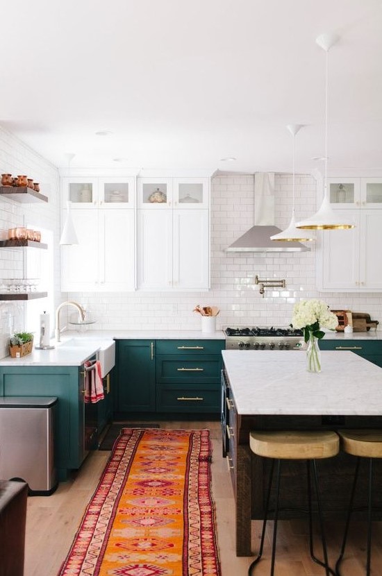 emerald and white cabinets, subway tiles for the backsplash and some metallic touches here and there